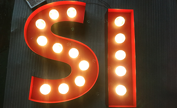 Frontlit bulb signs