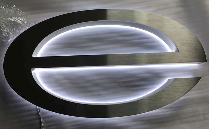 Brushed backlit signs