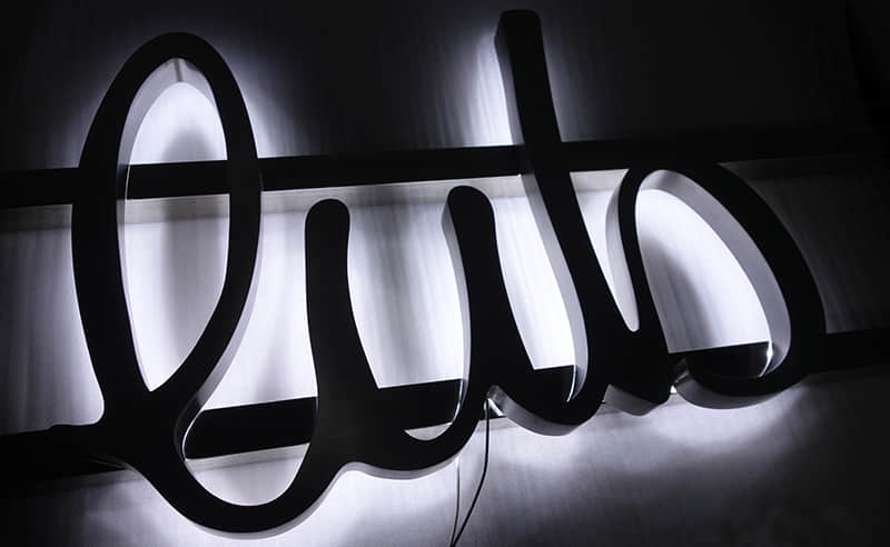 Backlit stainless steel letters