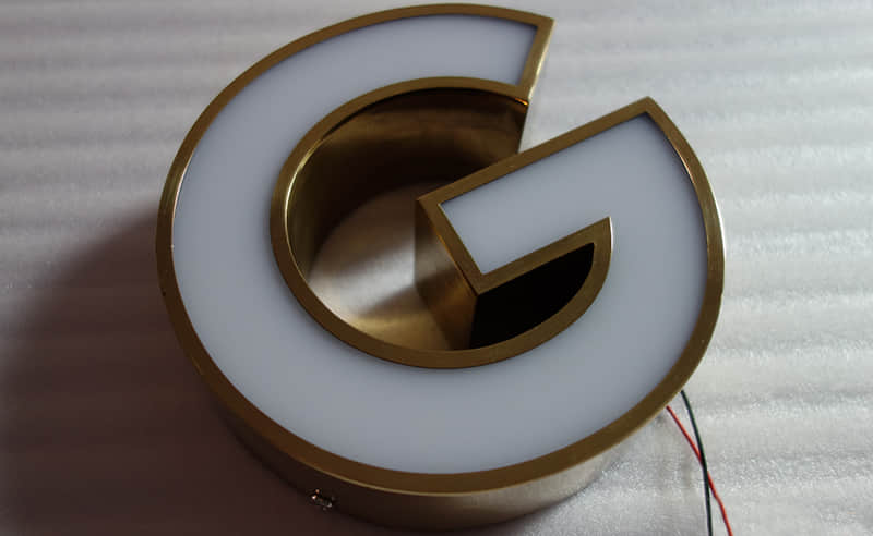 Frontlit brass channel letters