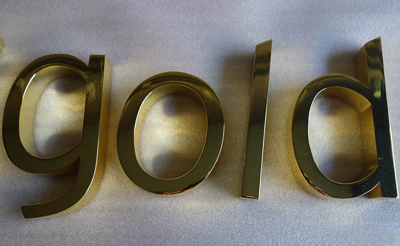 Electroplated brass signs