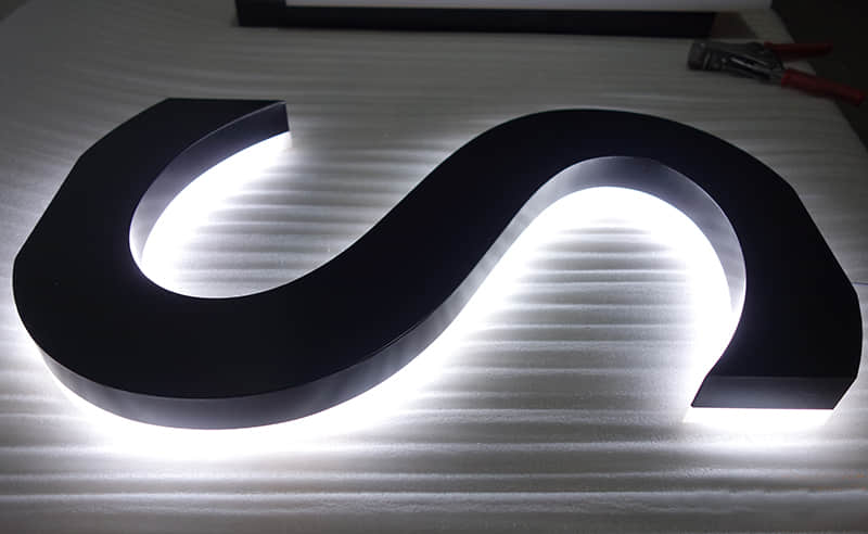 Rear lit stainless steel letters