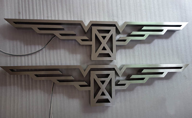 Fabricated stainless steel logos