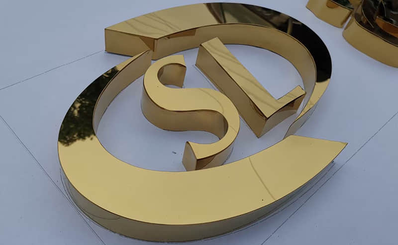 Electroplated stainless steel signs