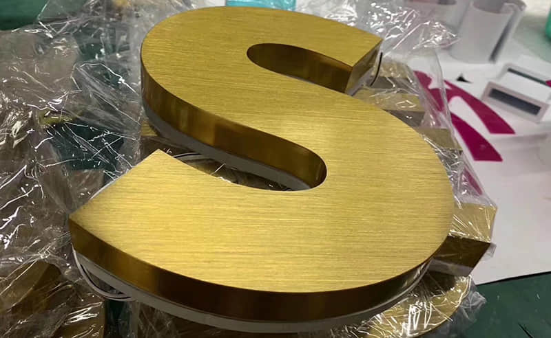 Fabricated stainless steel signs