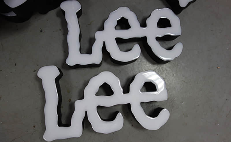 Frontlit resin signs