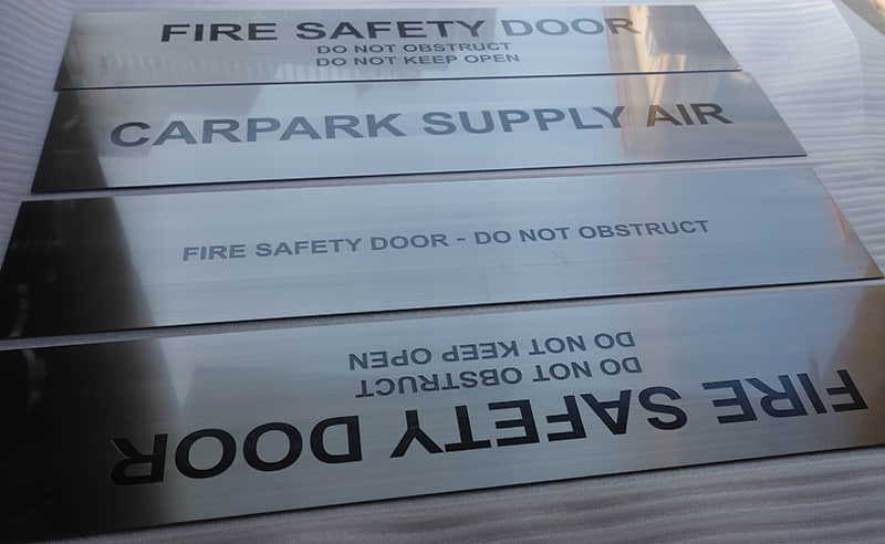 Engraved stainless steel plaques